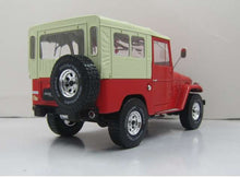 Load image into Gallery viewer, Triple 9 Collection Toyota Land Cruiser FJ40 1967 1002pcs 1/18